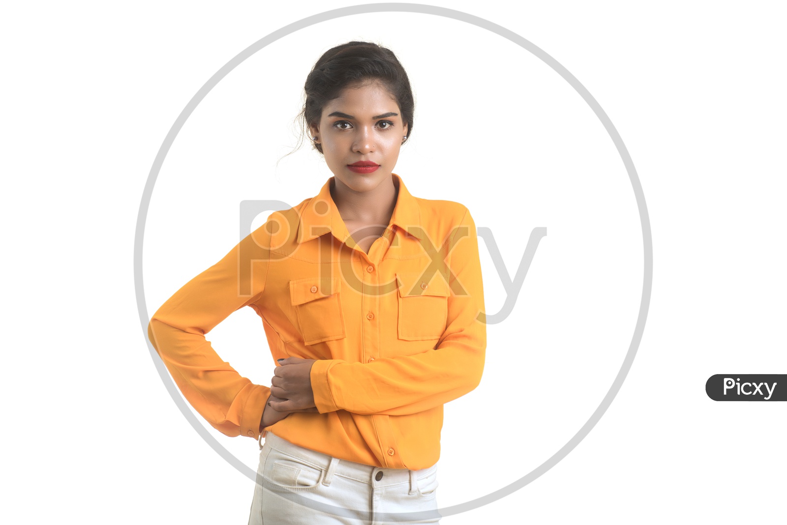 Portrait Of a Young Indian Girl Posing On an Isolated White Background