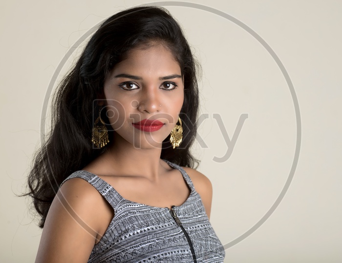 Indian woman wearing makeup and lipstick