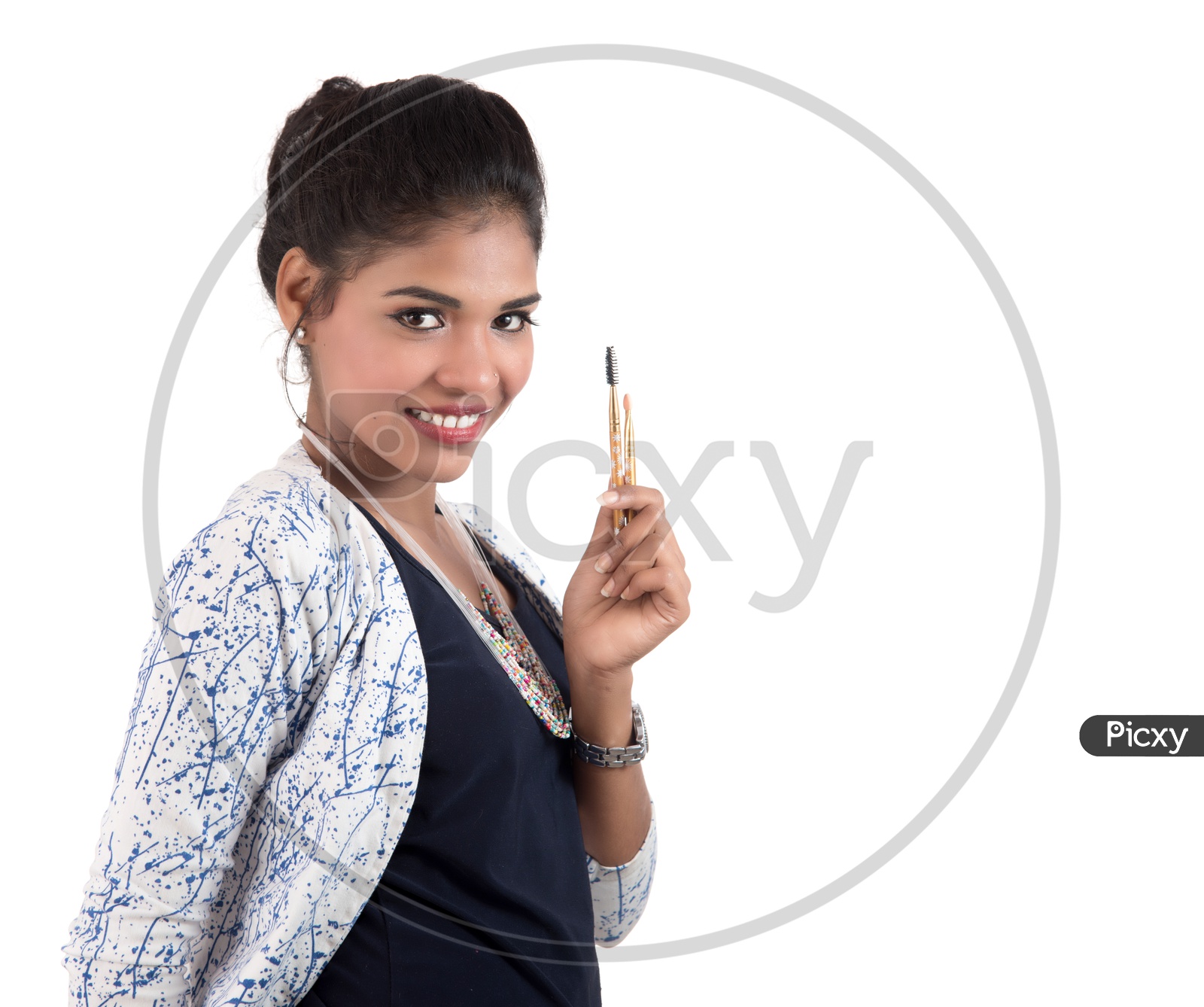 Young Indian Girl Enjoying With Makeup Brushes on an Isolated White Background