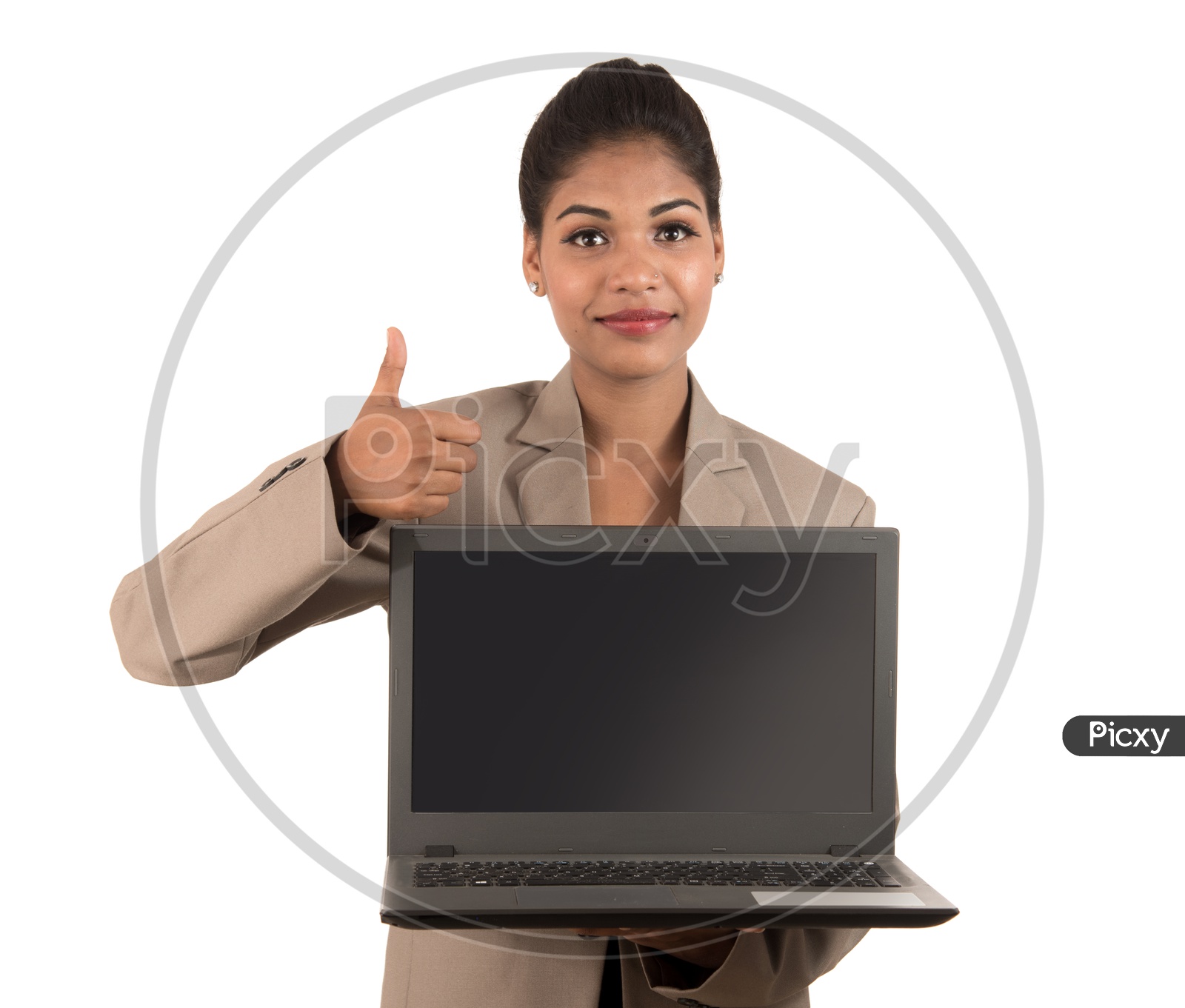 Young Indian business woman with a laptop giving a thumbs up