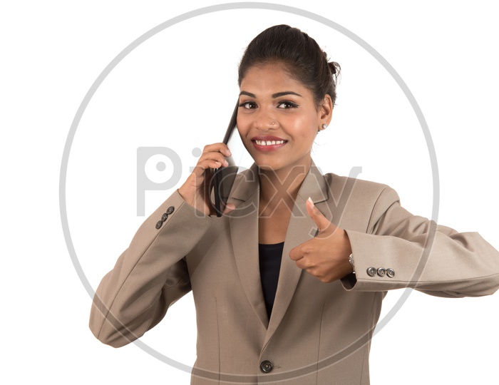 Happy Business Woman Talking On Mobile Phone Or Smartphone With an Expression on Face On an Isolated White Background