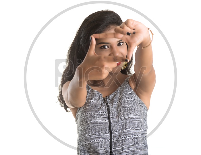 Portrait Of a Pretty Young Girl With Gestures And Expression On Face Posing On an Isolated White Background