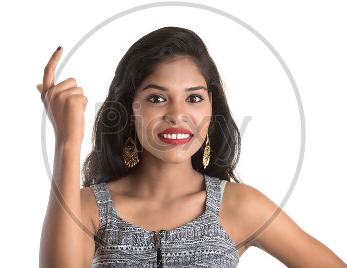 Pretty Young Girl Posing With an Expression  On an Isolated White Background