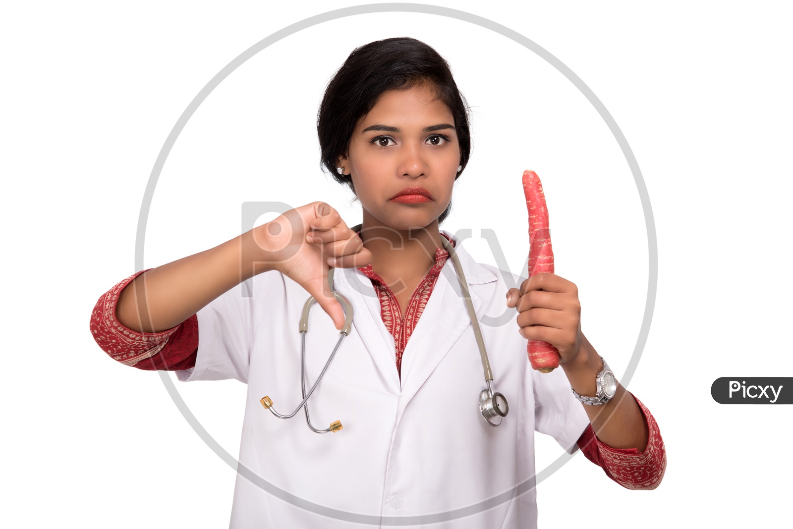 Indian Female Doctor holding carrot making a thumbs down sign