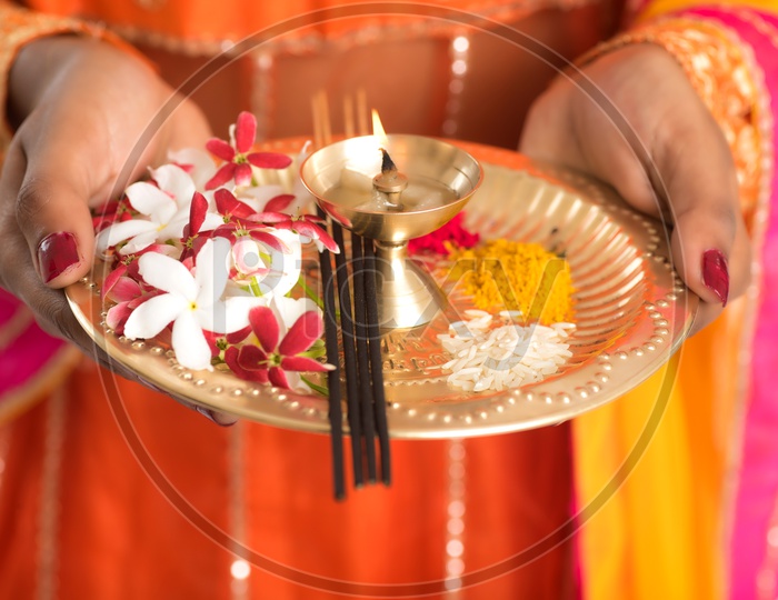 Indian Hindu Pooja Plates Or Pooja Thali Closeup With Fragrance Sticks , Dia , Flowers , Turmeric And  Kumkum
