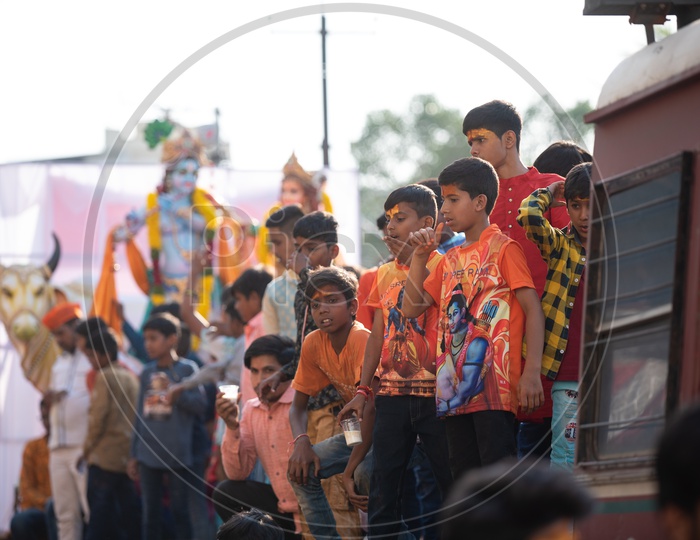 Young boys among a crowd at Shri Rama shobha yatra in Hyderabad