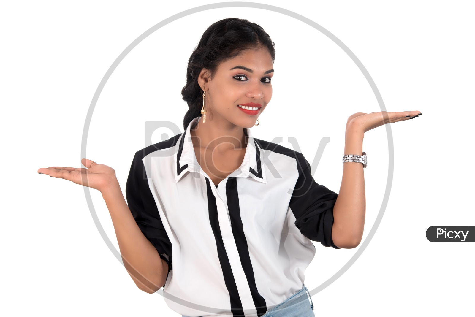 Young Beautiful Girl Holding Something In Hands With  a Smile Face Over an Isolated White Background