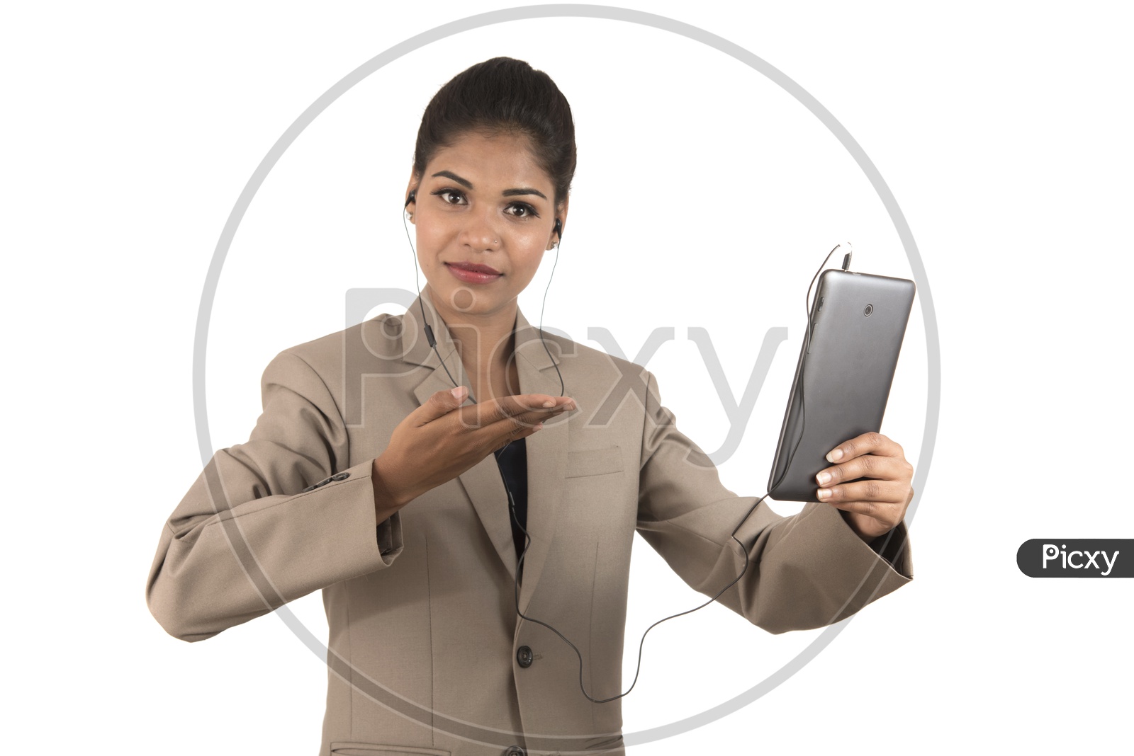 Young Indian business woman using a tablet smartphone