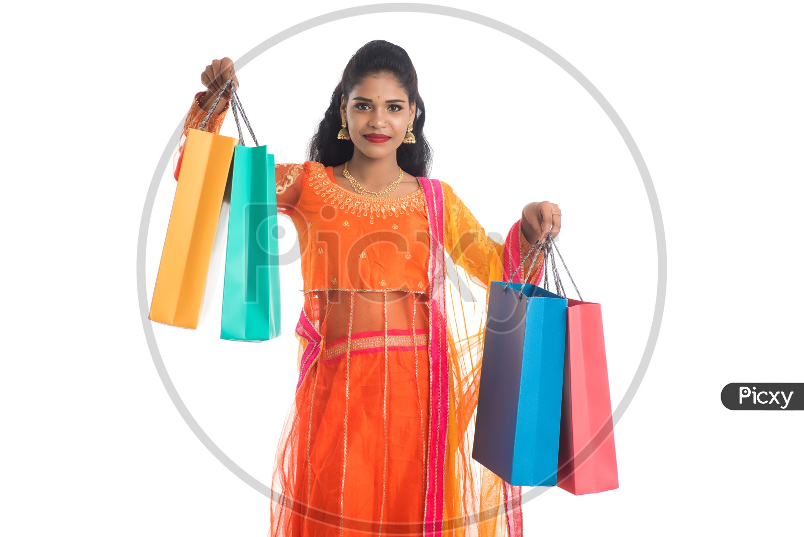 Image of Young Indian Traditional Girl Holding Shopping Bags Or ...