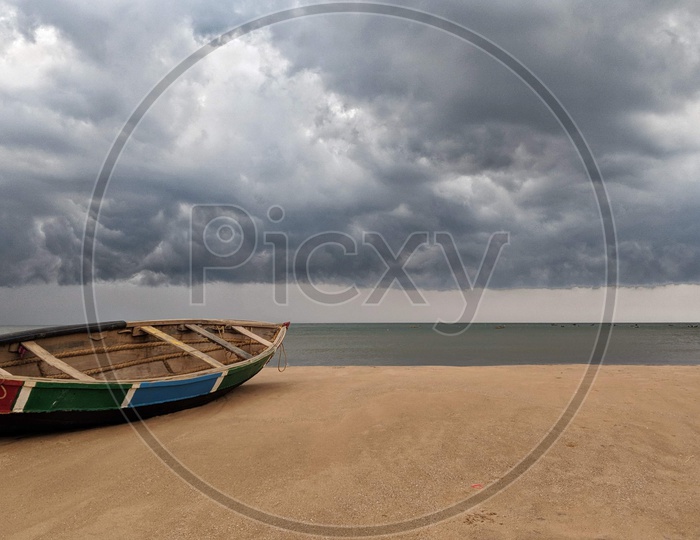 A Lone Boat In a Beach