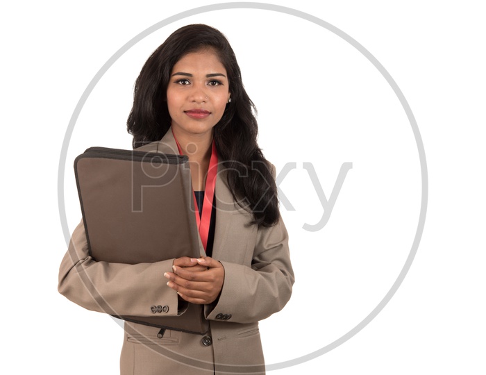 Young Indian happy business woman holding folder