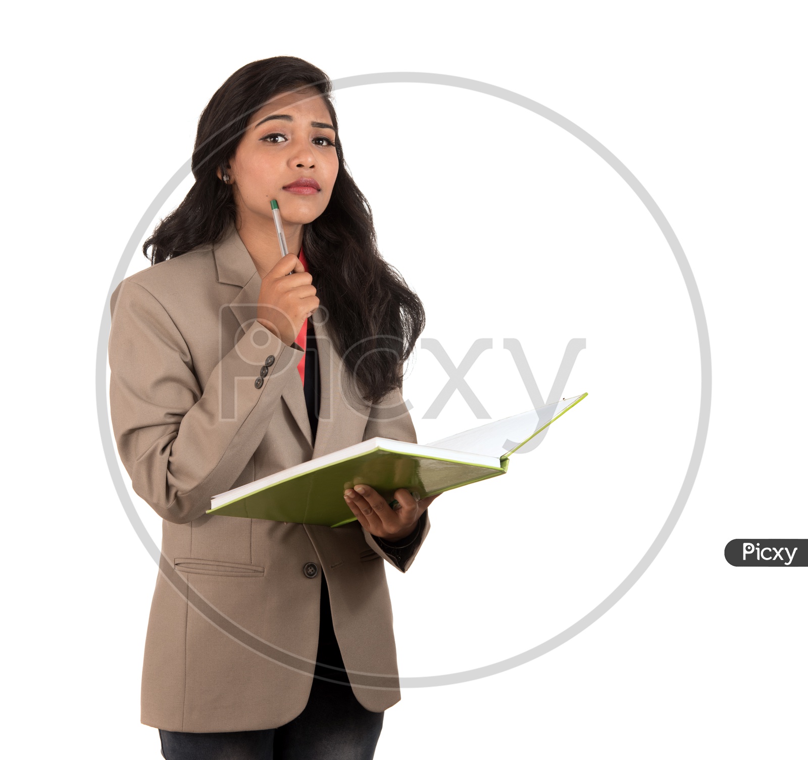 Young Indian business woman holding a book and a pen