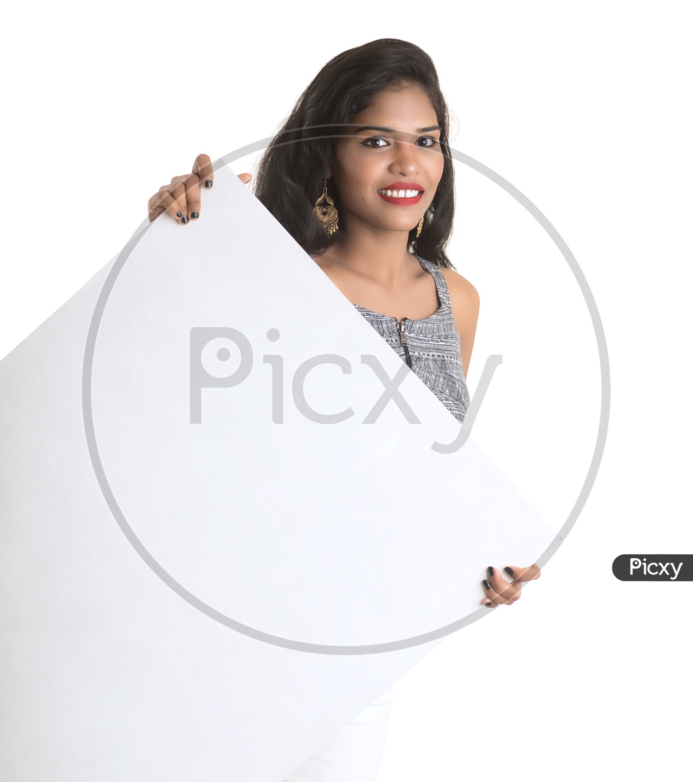 Pretty young Girl Showing Empty Placard With Space and With Expression On Face on an Isolated White Background