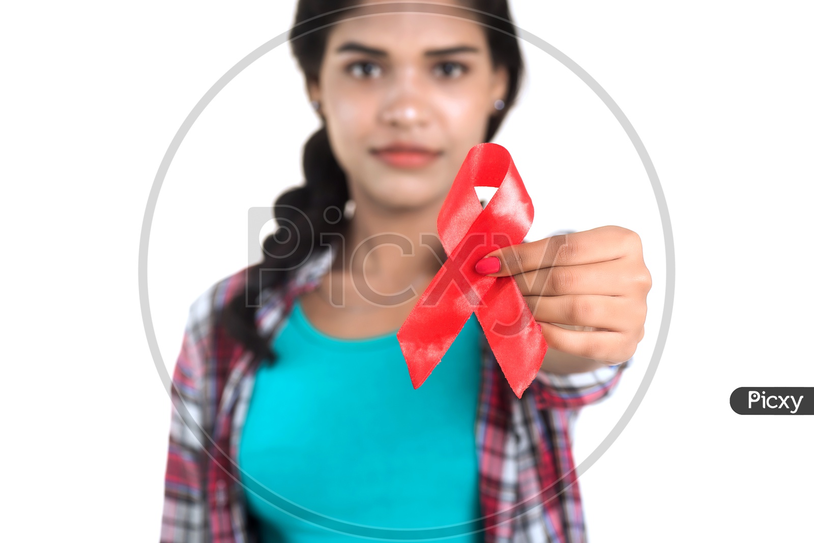 Young Woman Showing Red HIV Ribbon , AIDS Awareness Ribbon  on an  Isolated White Background