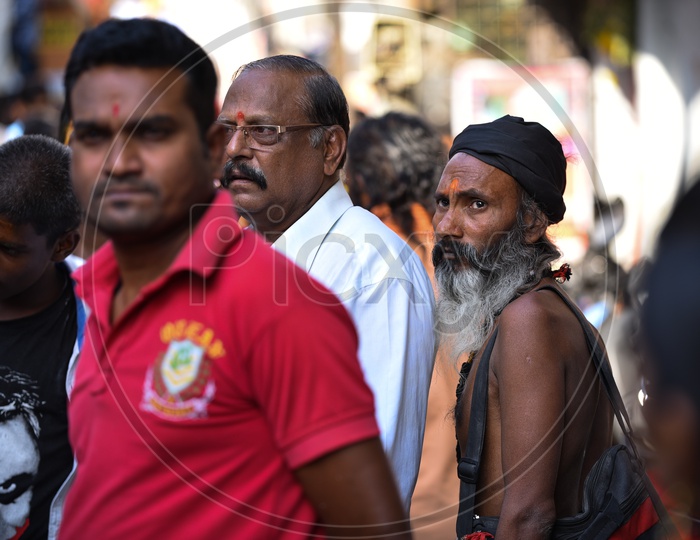 Sadhu among a crowd at Shri Rama Shobha yatra in Hyderabad