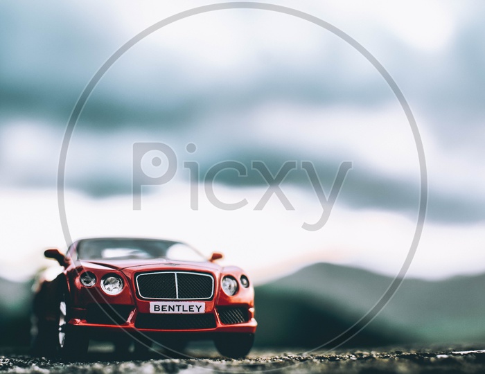 A Composition Shot Of A Bently Car Toy