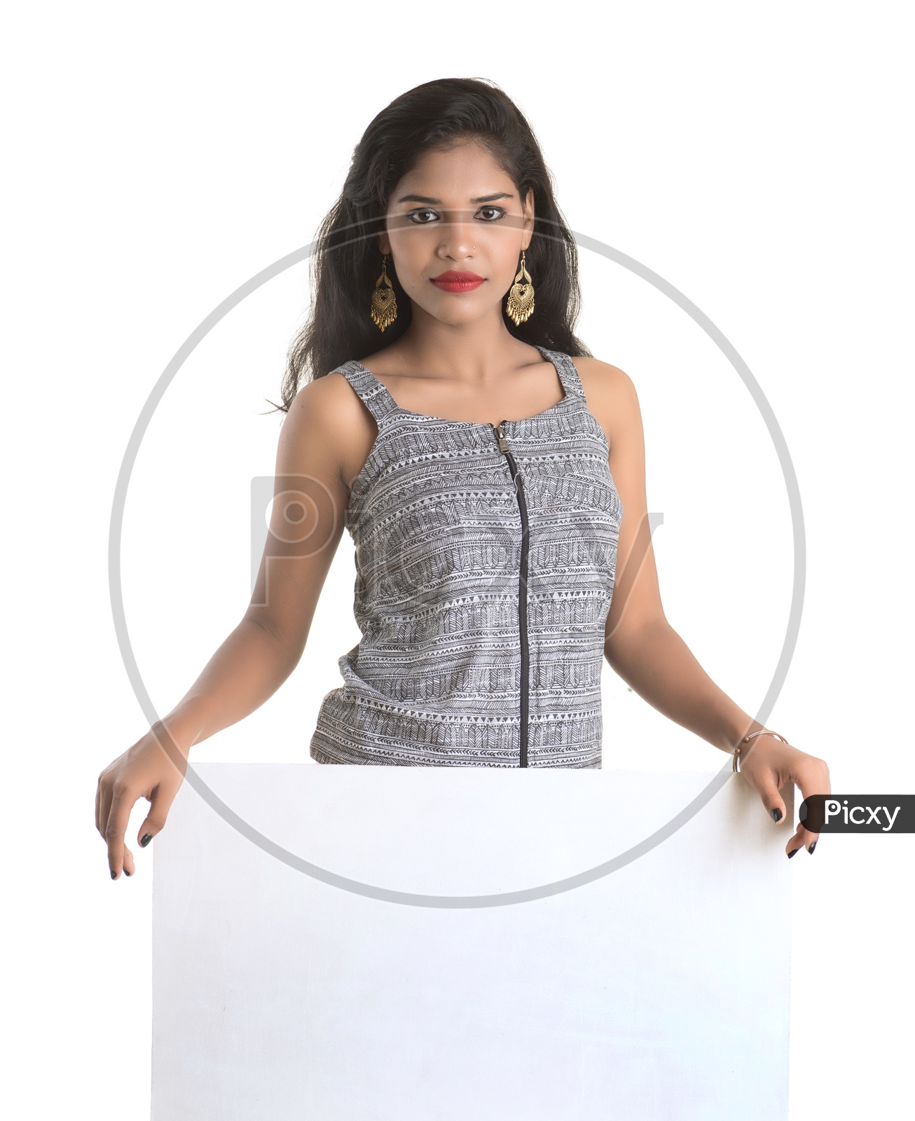 Indian woman holding a white board