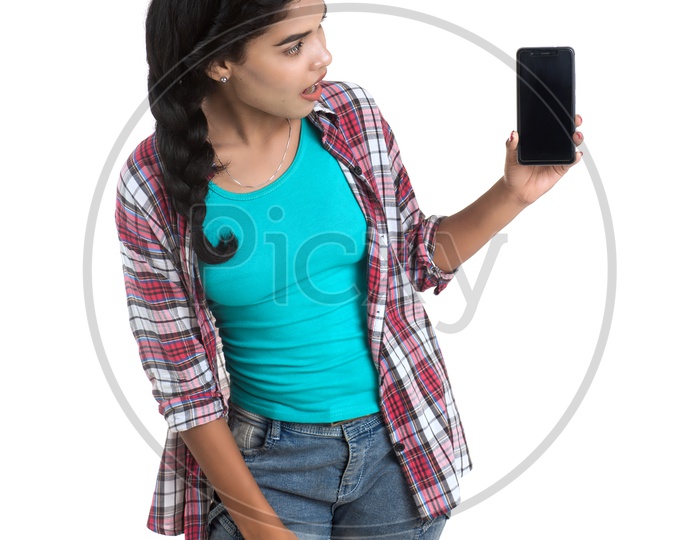 Pretty Young Girl Showing Blank Smart Phone Screen on an Isolated White Background