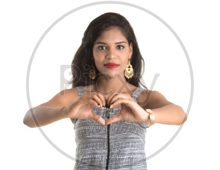 Pretty Young Girl With a Expression And Gesture  On Face And Posing On an Isolated White Background