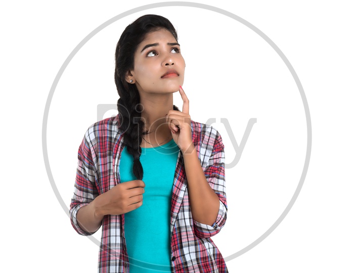 Young Indian Girl Thoughtfully Thinking With an Expression on Her Face On white Background