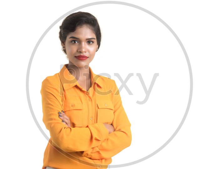 Portrait of beautiful Indian woman wearing orange shirt