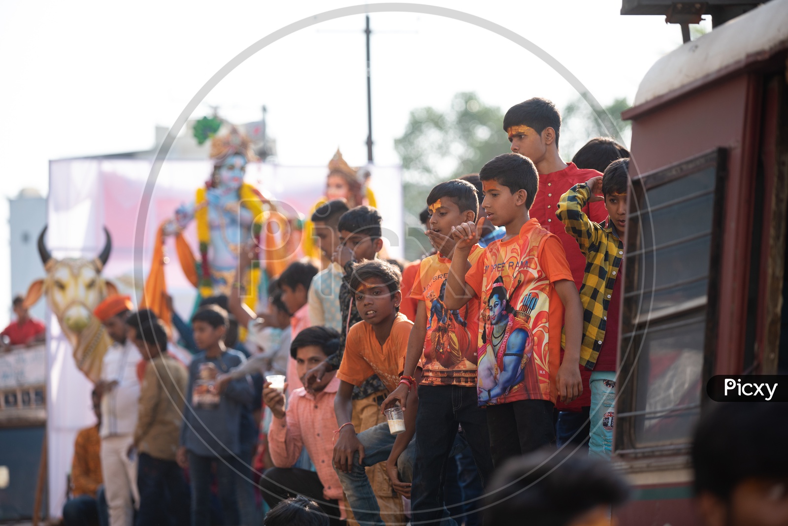Young boys among a crowd at Shri Rama shobha yatra in Hyderabad