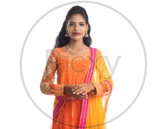 Portrait Of a Young traditional Indian Woman With a Smile Face On an Isolated White Background