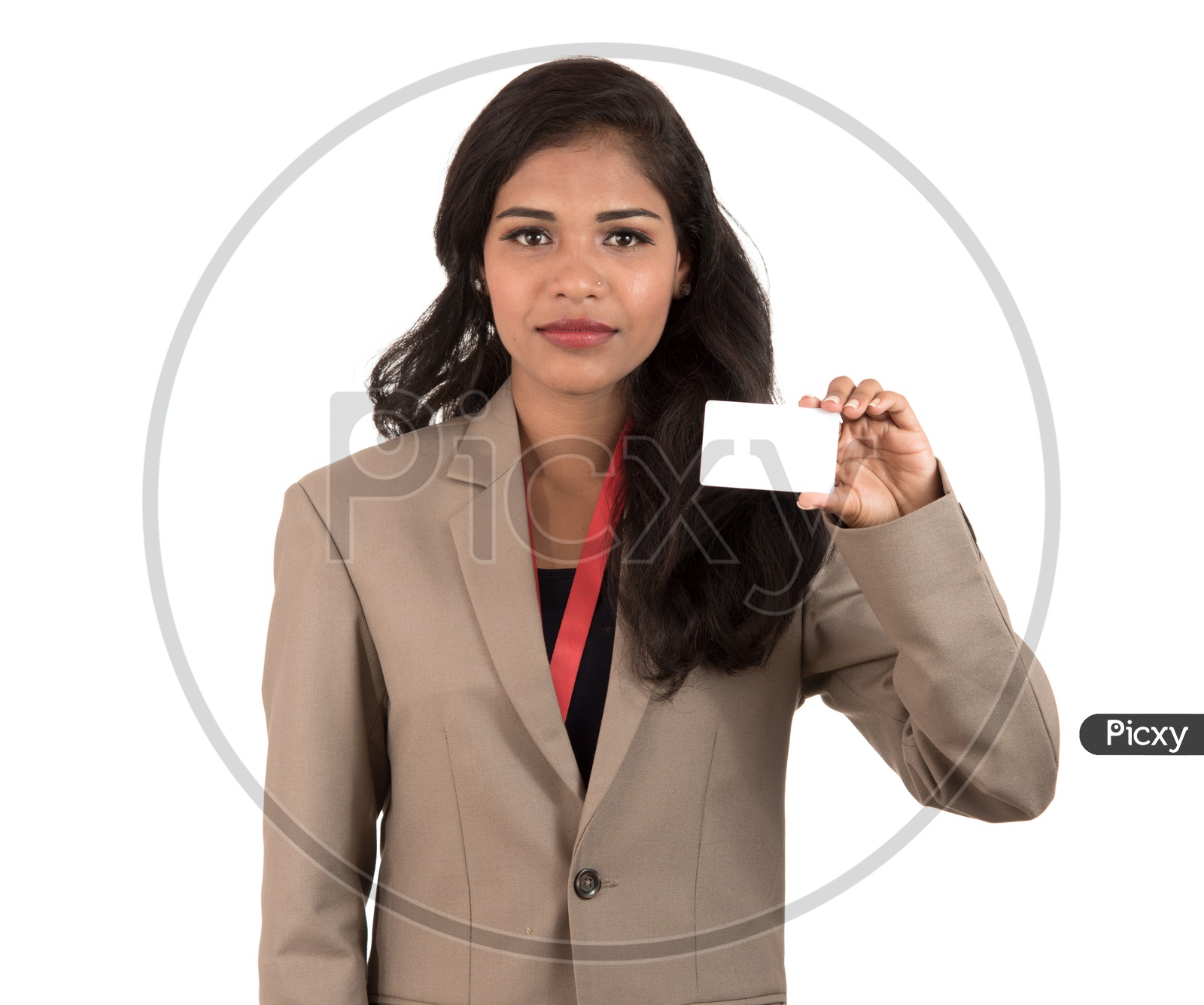 Smiling Indian business woman holding a blank business card or ID card