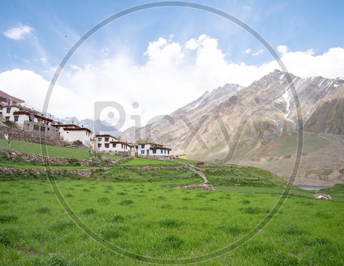Snow capped Mountains of Spiti Valley with houses