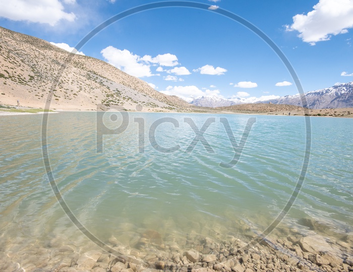 Dhankar lake with barren mountains in the background
