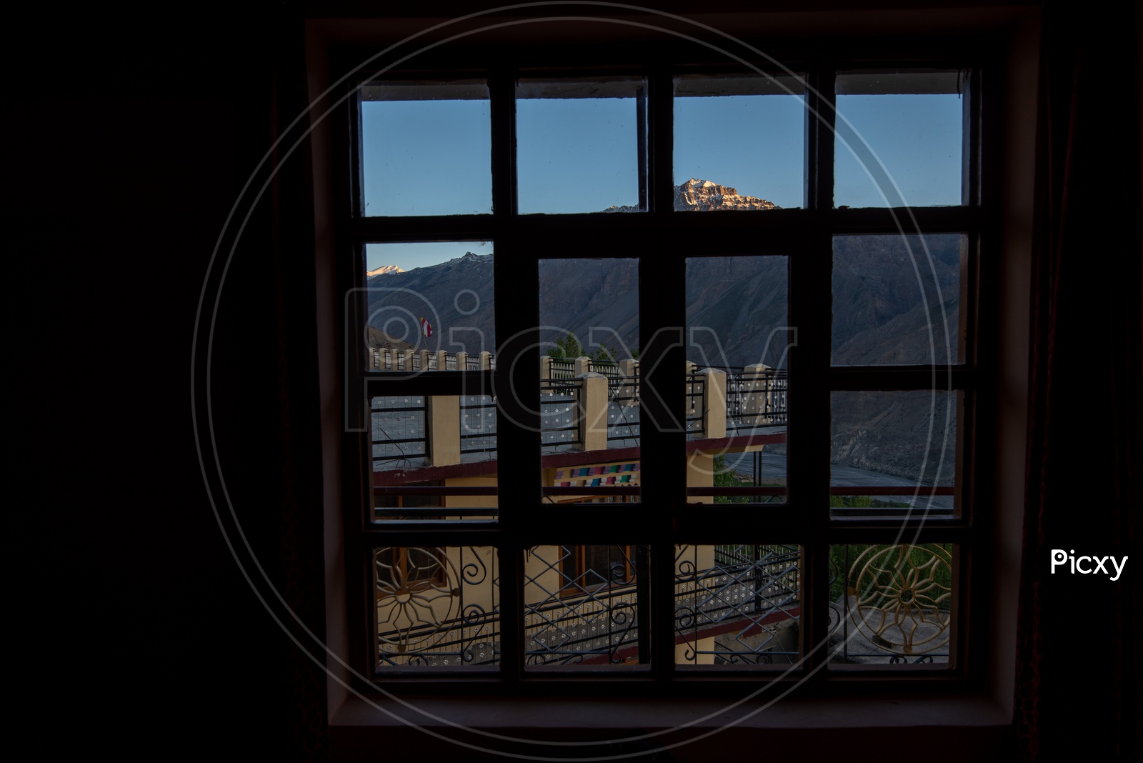 View of a mountain peak from a window