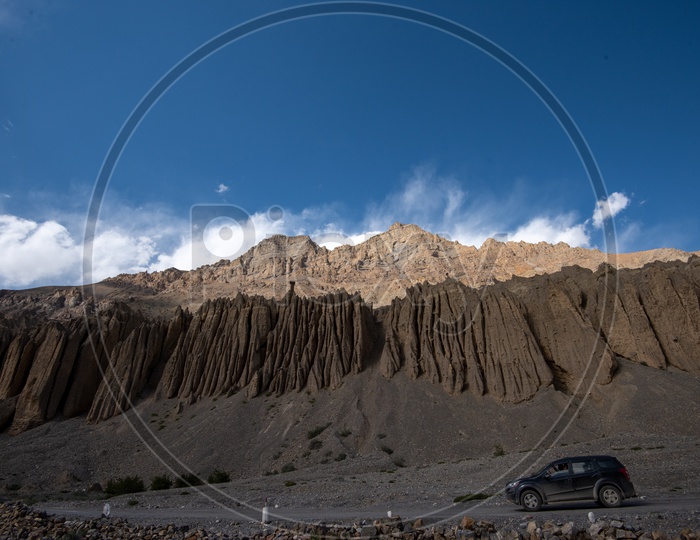 A car on the mountain road in Spiti Valley