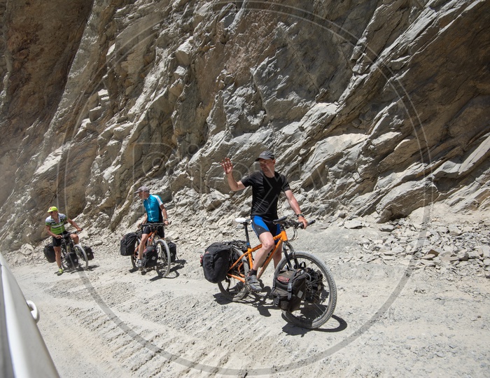 Cyclists On the  Roads Of Leh