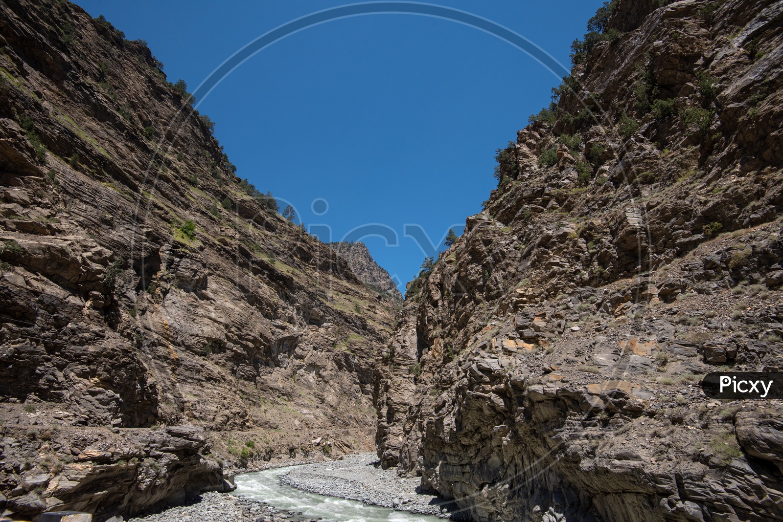 River stream between the rocky mountains in Spiti Valley
