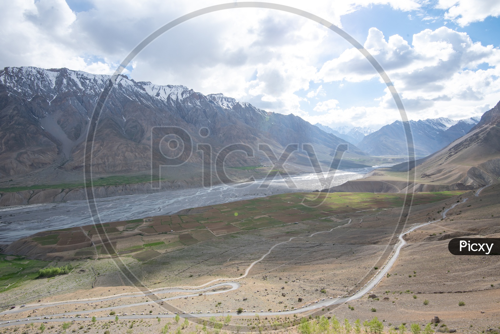 Agricultural farm lands and roads beside the river in Spiti Valley