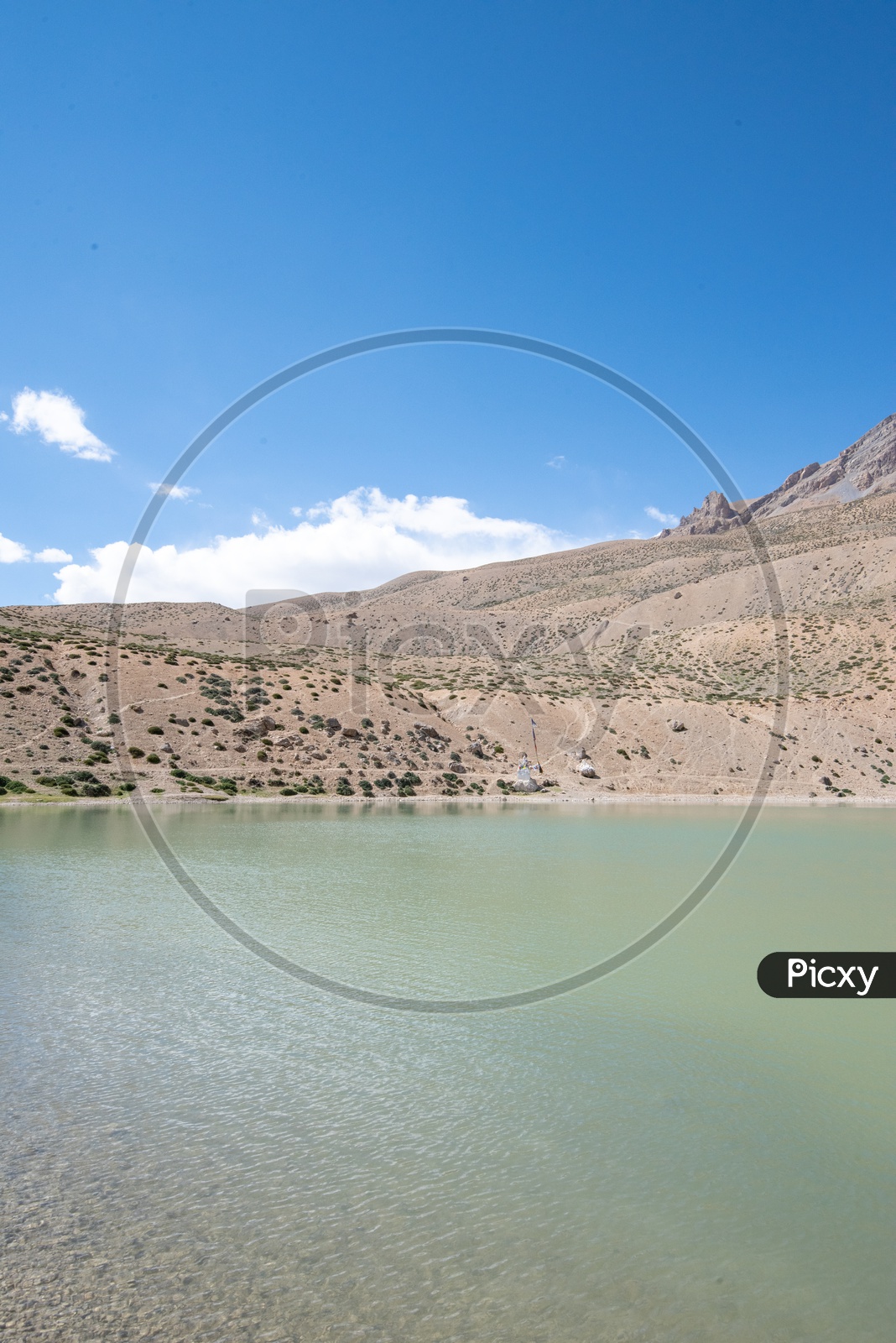 Dhankar lake with barren mountains in the background