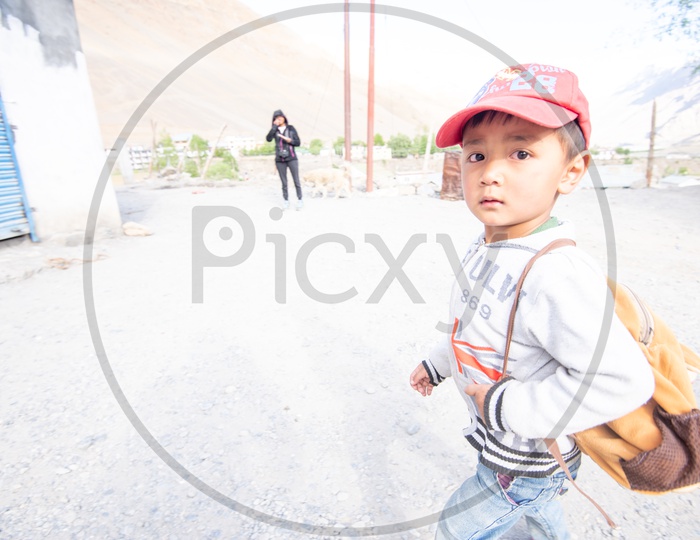 A school boy with hat in Spiti Valley