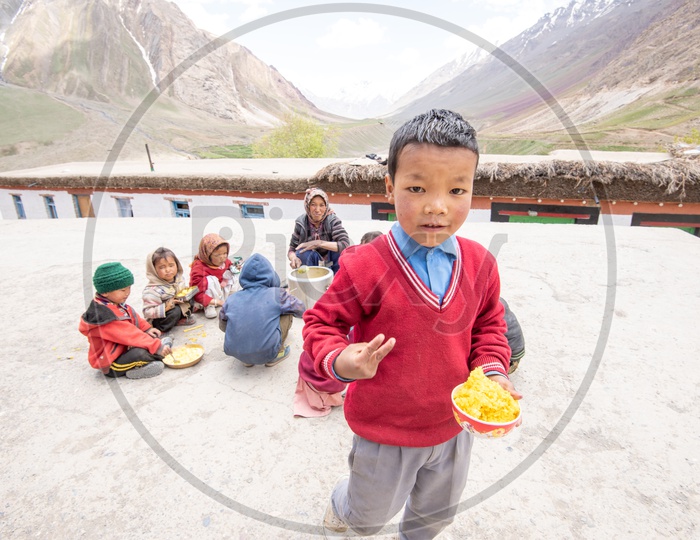 Children Having Their Meal at  School  in Leh