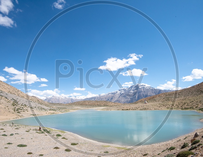 Dhankar lake with mountain peaks in the background