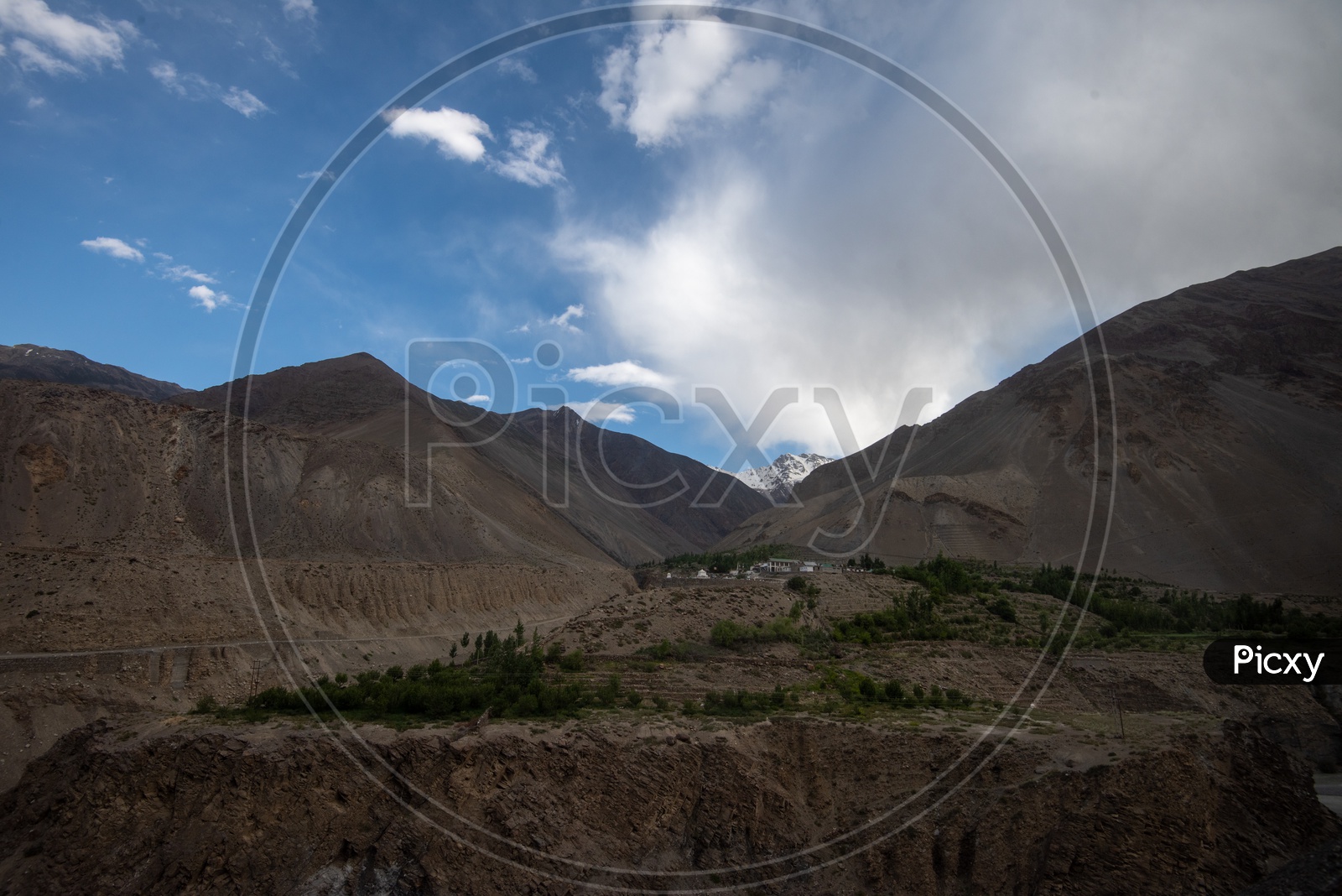 A Landscape Of a  Sand Dunes And Mountains in Leh