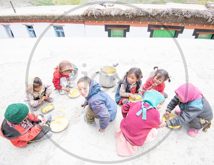 Children Having Their Meal at  School  in Leh