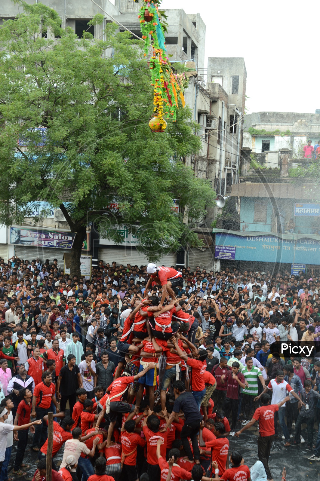 Crowd Of Young People Celebrating  'Govinda' at Dahi Handi Festival to celebrate God Krishna's  Birth in Amaravathi , Maharashtra