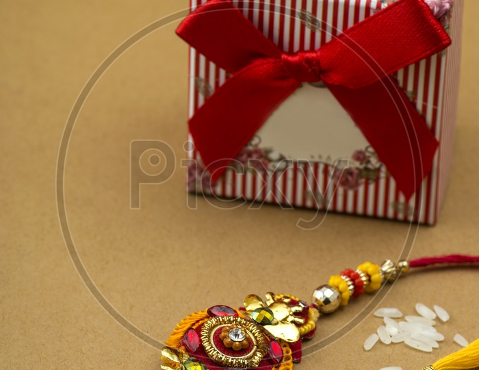 Indian Festival Rakhi With A Gift To Sister