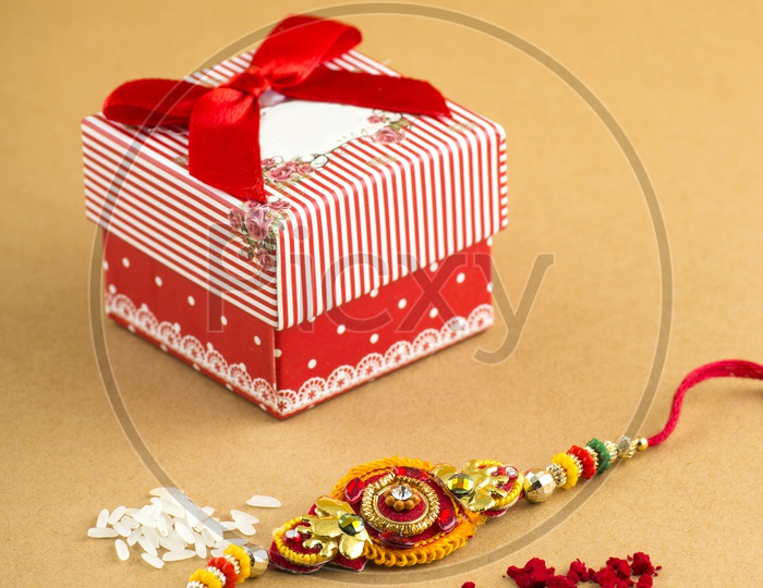 Elegant Raakhi With Rice Grains , Kumkum  And Gift Box  For Raksha Bandan Festival