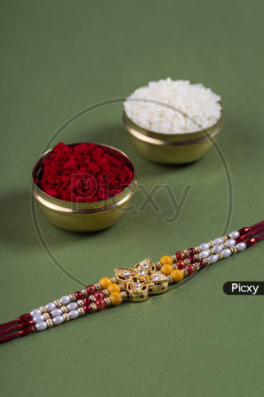 Elegant  Raakhi With Rice Grains And  Kumkum For Raksha Bandhan Festival  Wishes