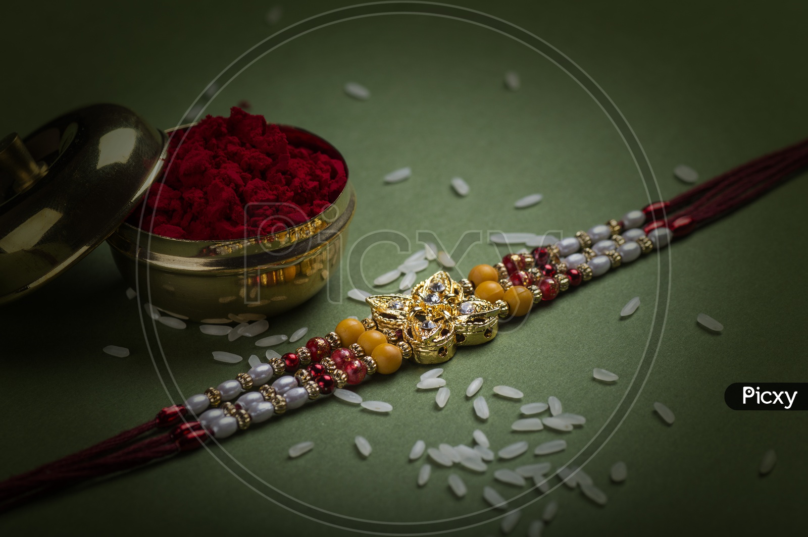 Elegant  Raakhi With Rice Grains And  Kumkum For Raksha Bandhan Festival