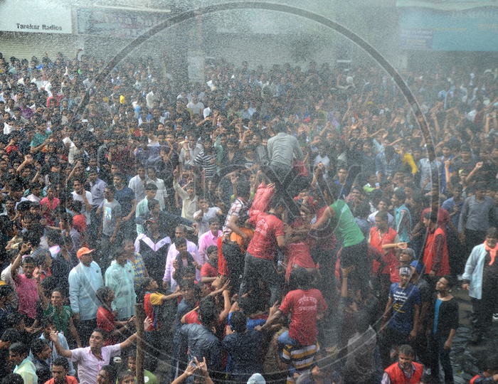 Crowd Of Young People Celebrating  'Govinda' at Dahi Handi Festival to celebrate God Krishna's  Birth in Amaravathi , Maharashtra
