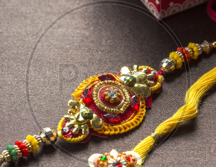 Indian Festival Rakhi With A Gift To Sister