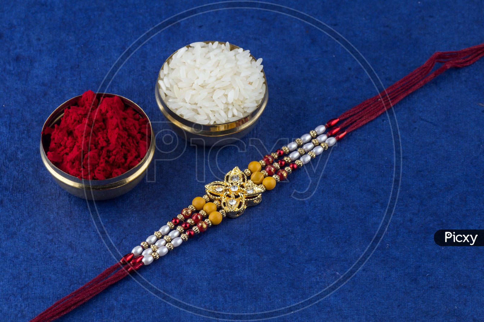 Elegant Raakhi With Rice Grains and Kumkum For Raksha Bandhan Festival