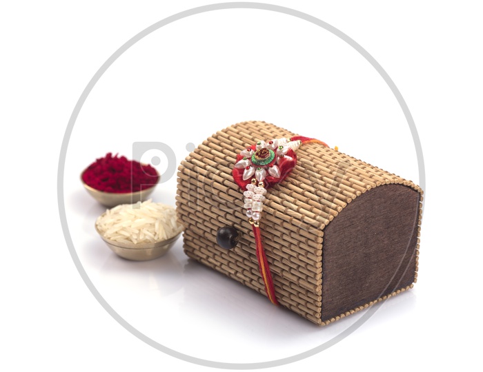 Elegant Raakhi With Rice Grains , Kumkum and Gift Box For Raksha Bandhan Festival